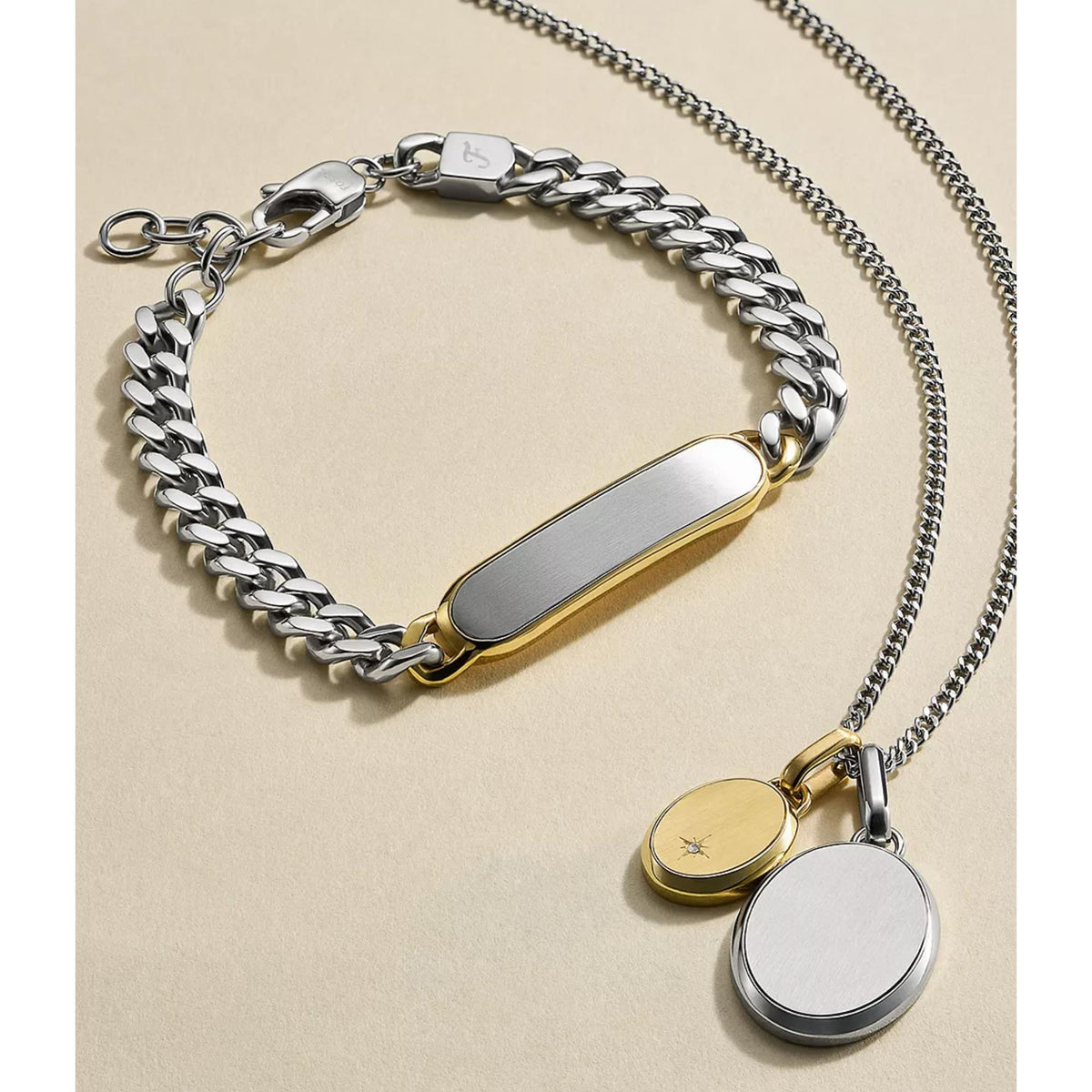 Two-tone stainless steel pendant necklace set: linked bracelet-style chain plus oval charms.