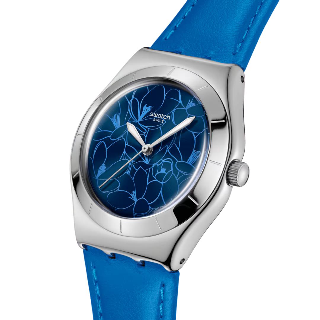 Blue leather strap watch, blue patterned dial and silver-tone case with crown detail