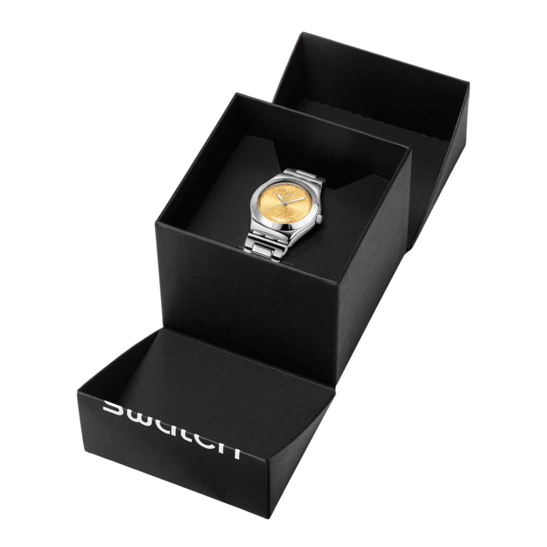 Open black Swatch watch box displaying yellow dial steel strap watch