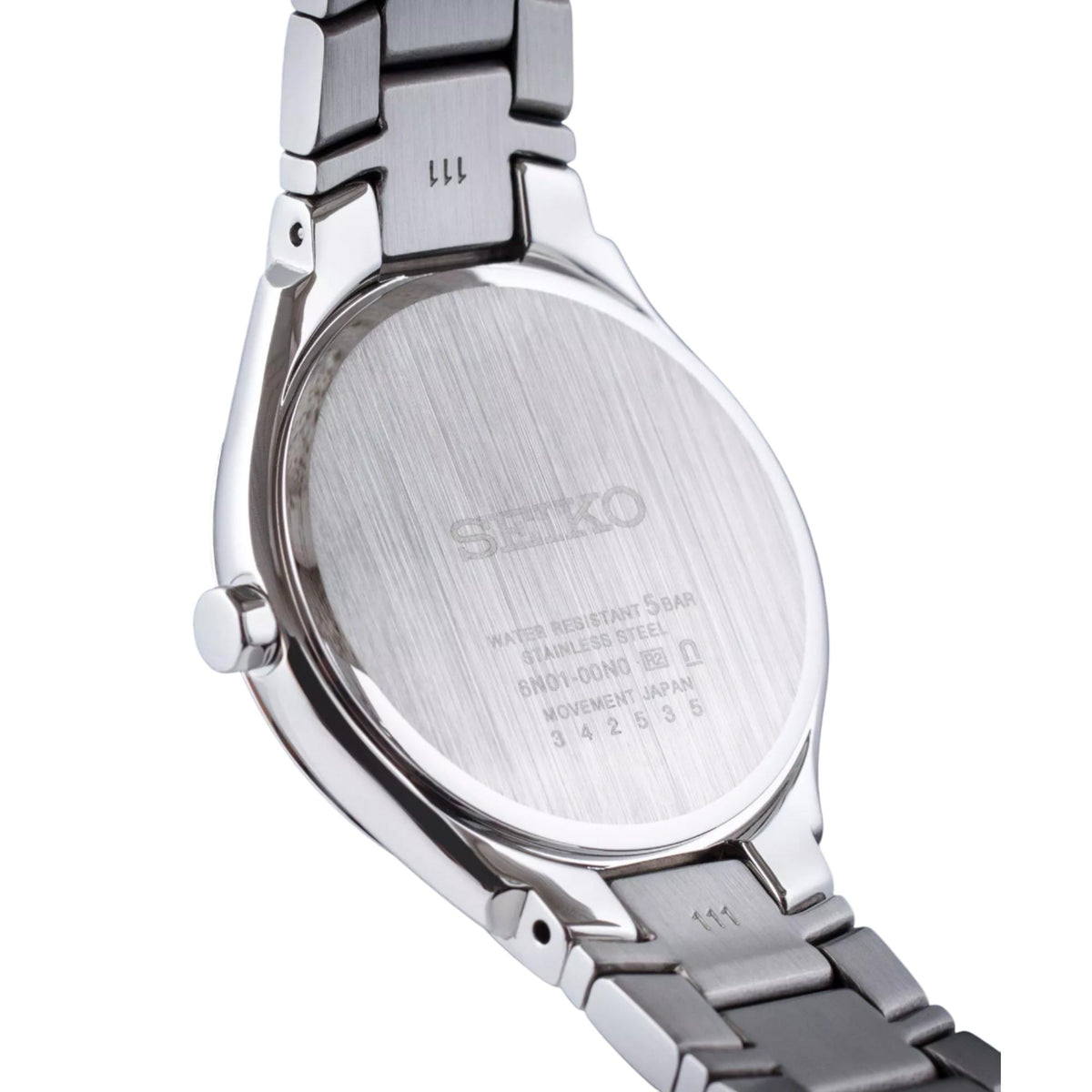 Stainless steel watch case back with engraved markings and link bracelet