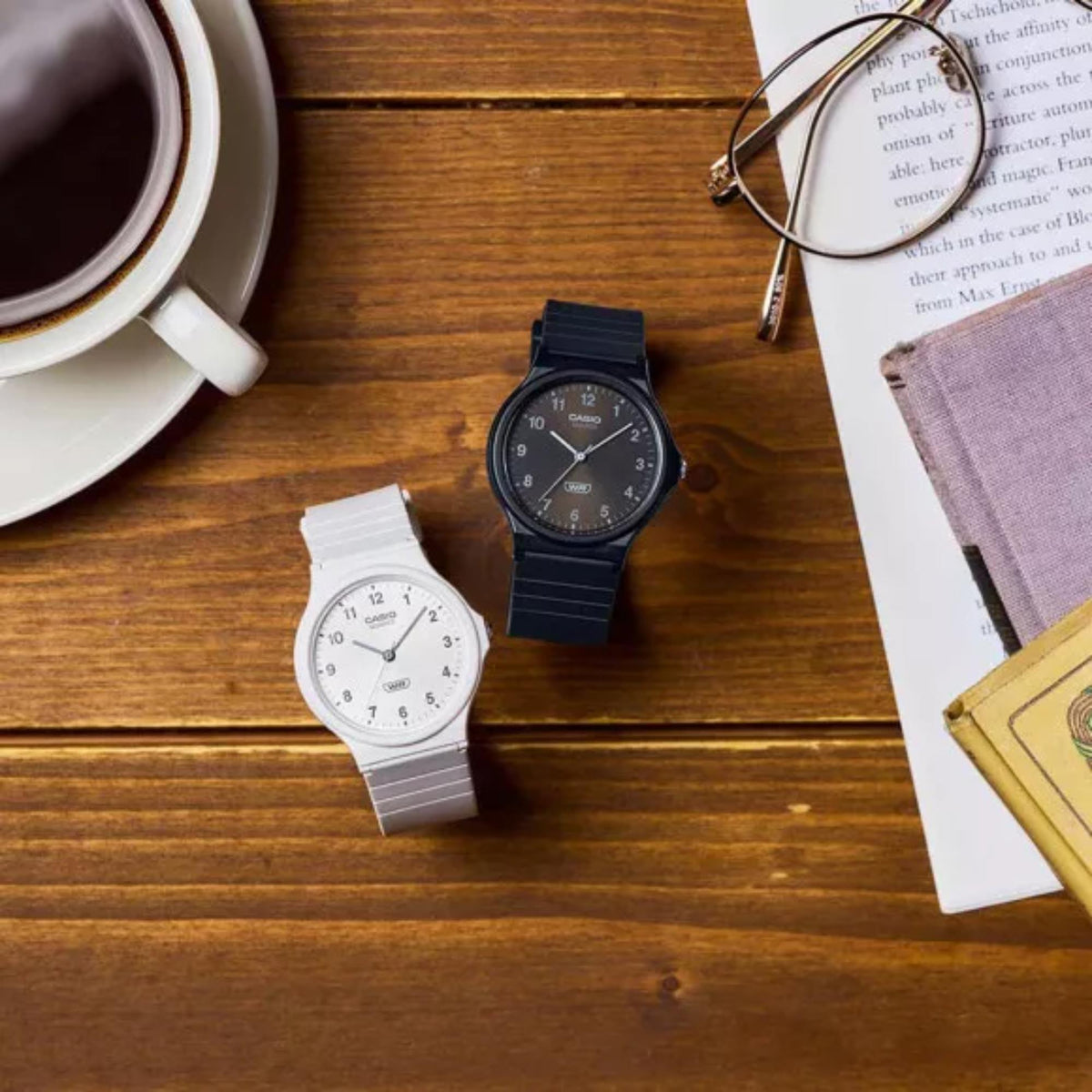 White resin strap quartz watch on a wooden surface, white dial with Casio logo