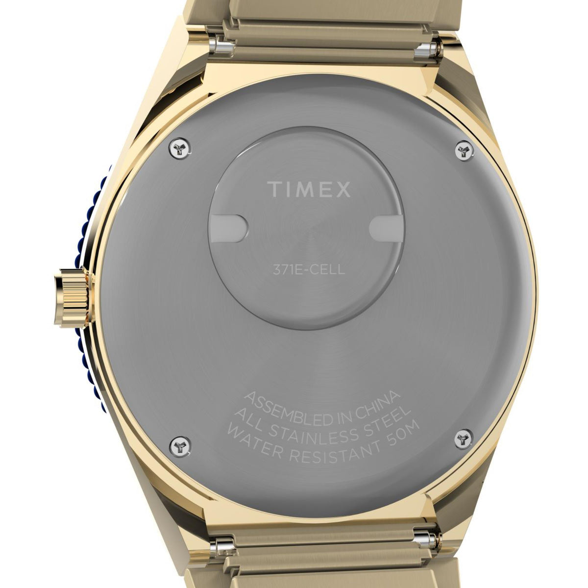 Gold-tone steel caseback with round cover and 'TIMEX' marking