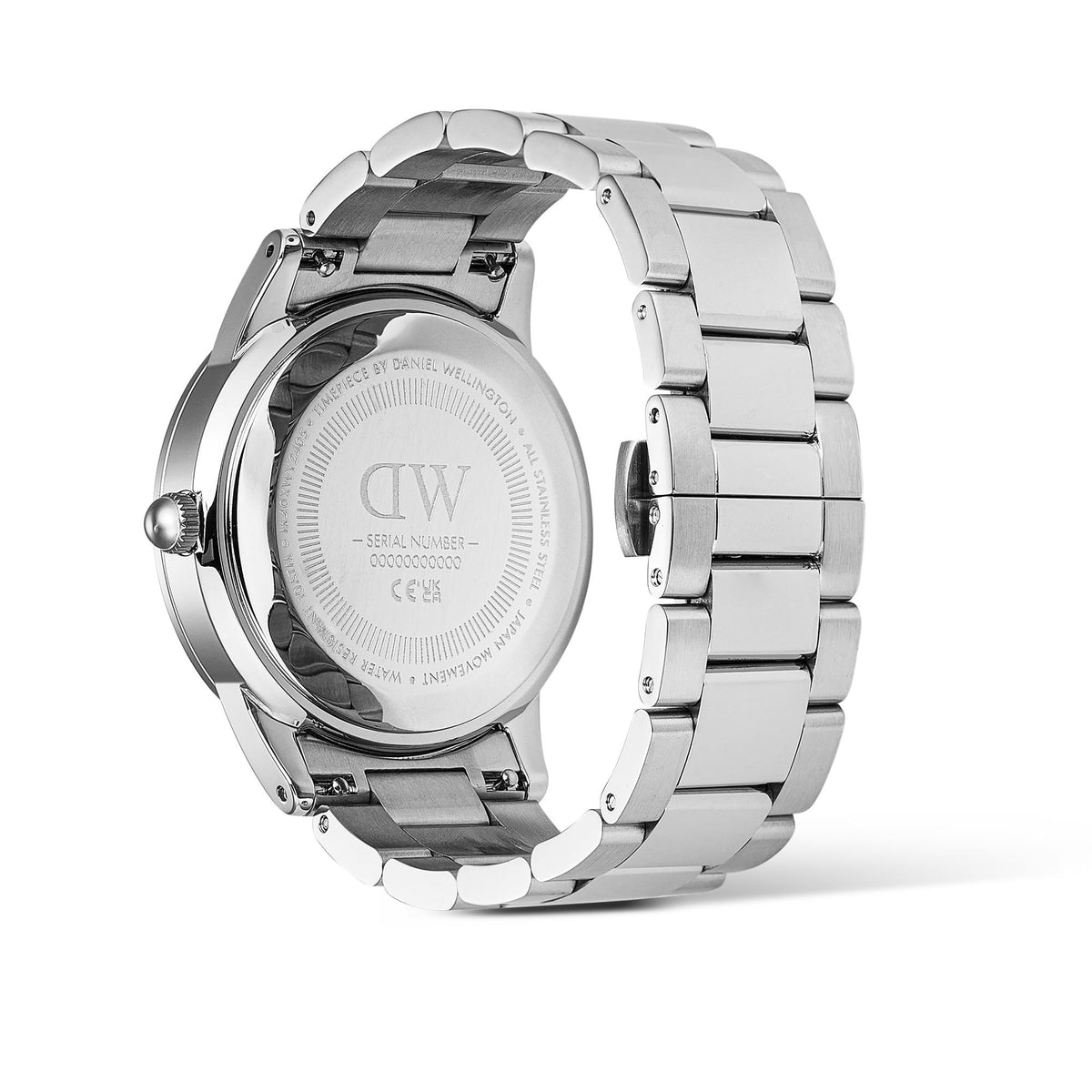 Stainless steel watch case back with engraved markings and metal link bracelet