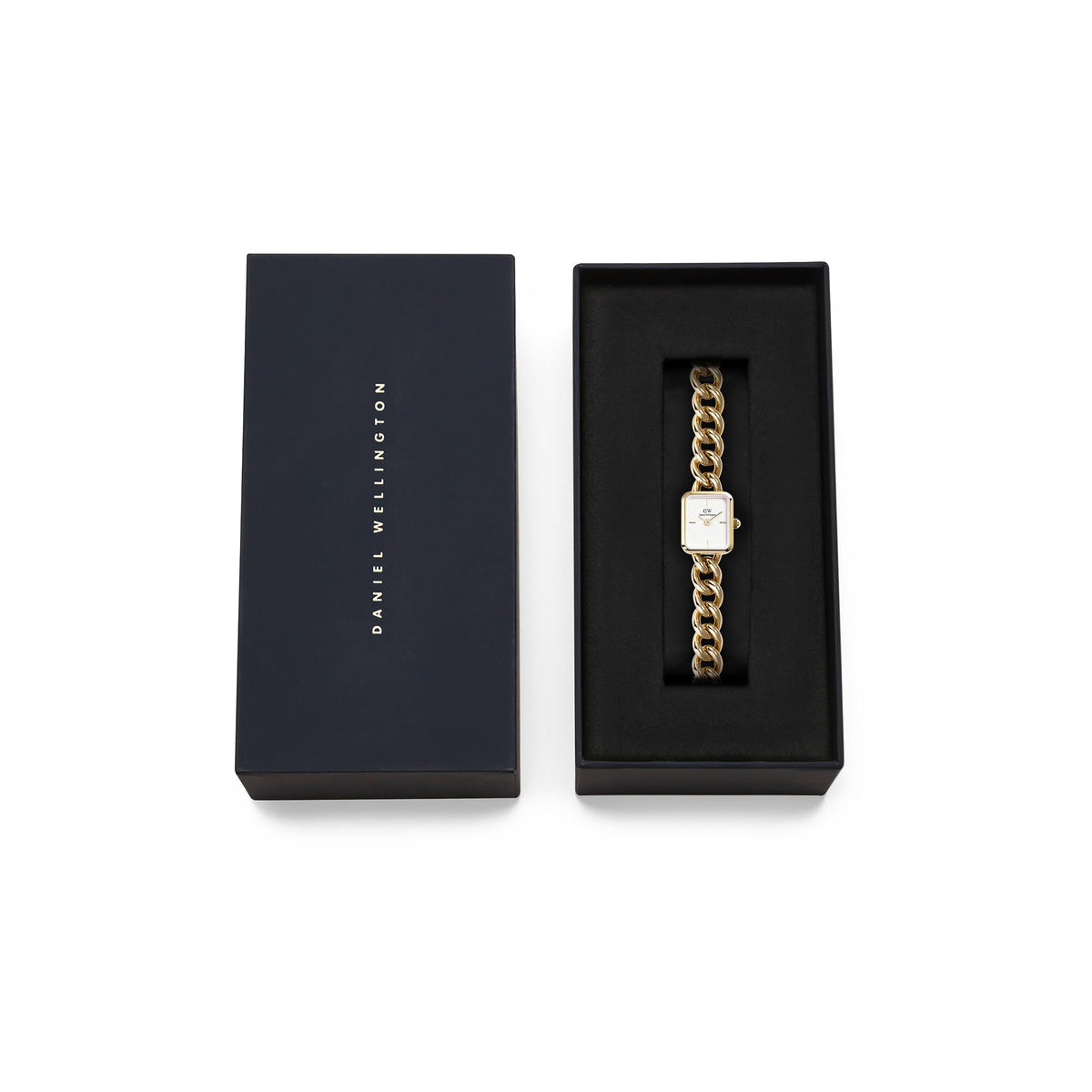 Gold-tone watch bracelet displayed in a black Daniel Wellington gift box