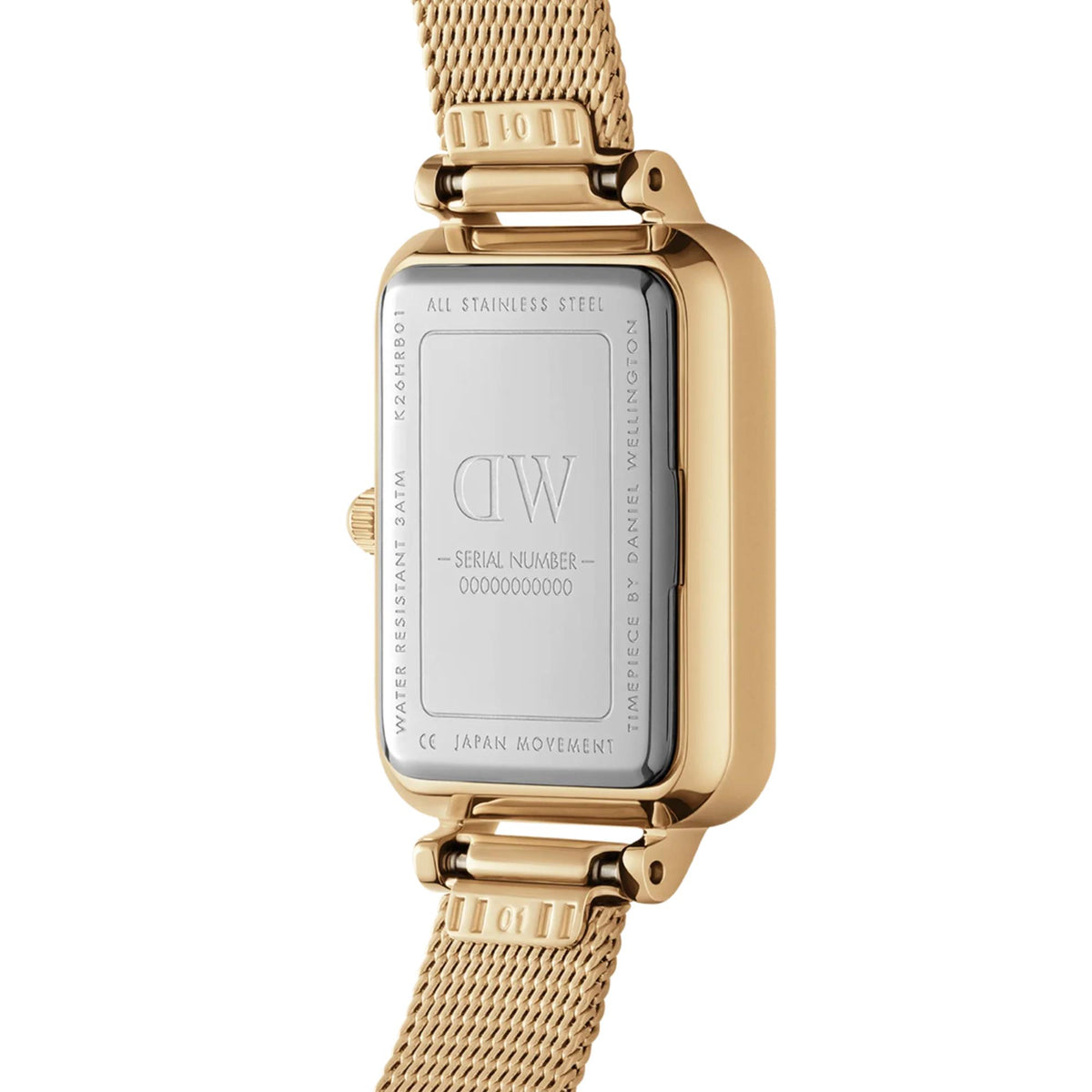 Back view of gold-tone square watch with mesh bracelet and engraved case