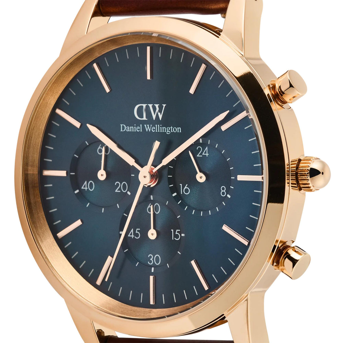 Daniel Wellington chronograph watch close-up, blue dial with subdials, gold-tone bezel