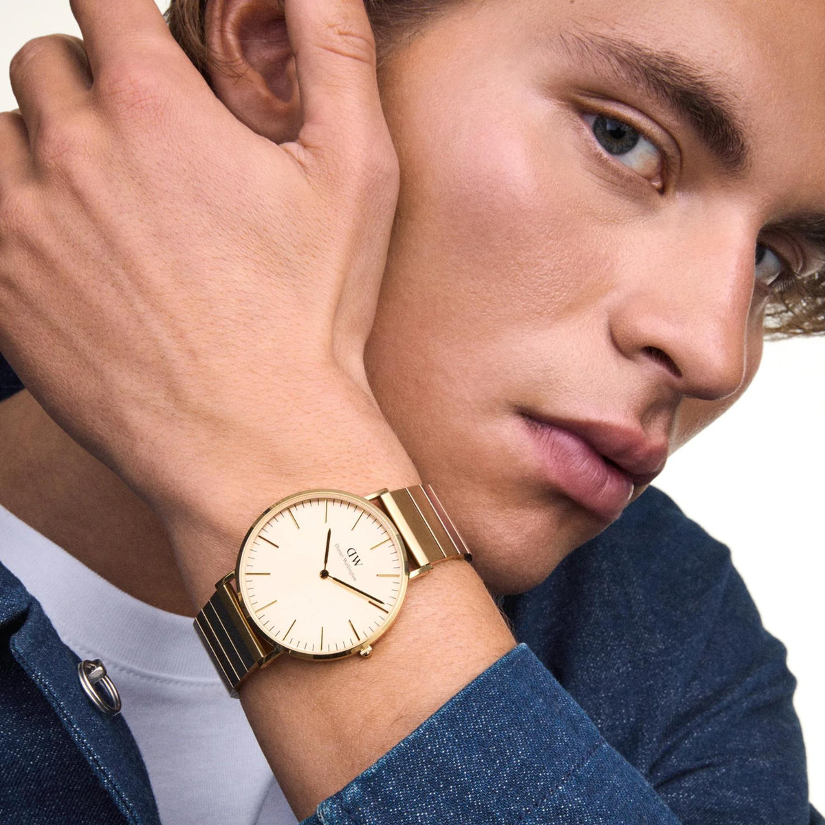 Gold dial steel men’s quartz watch with gold-tone bracelet and minimalist hands