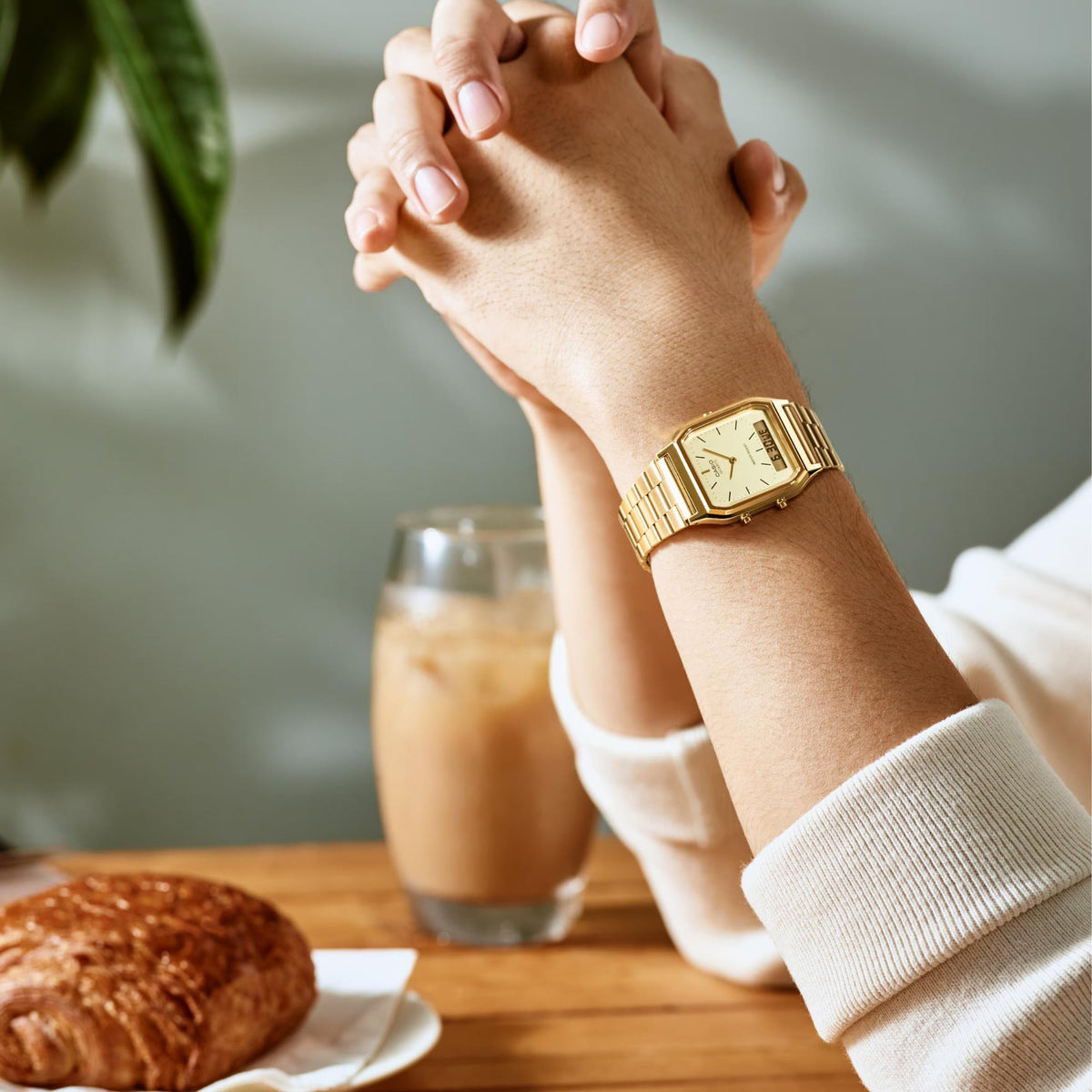 Casio Collection Vintage AQ-230GA-9DMQYES on wrist, highlighting the gold-plated case and matching link bracelet