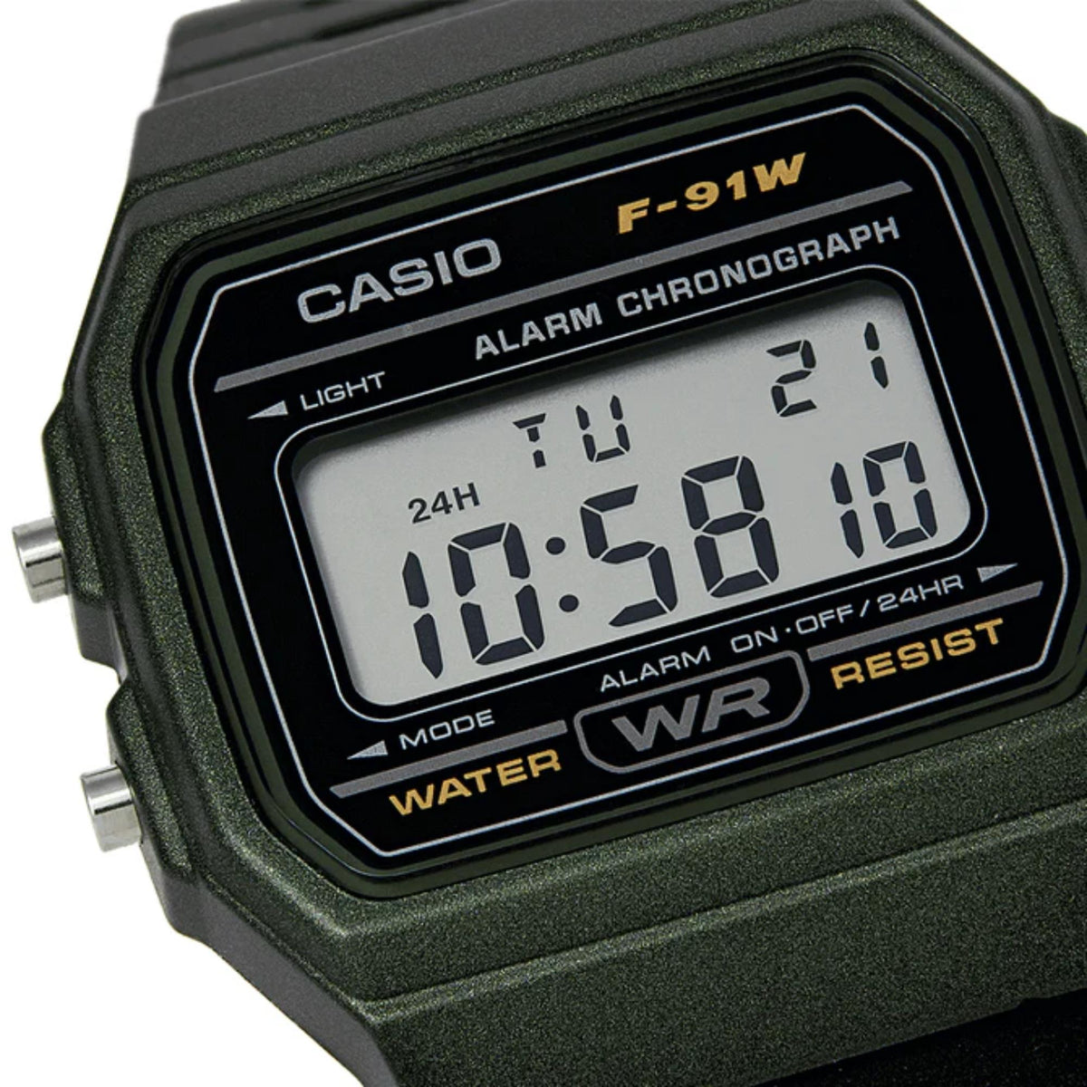 Casio F-91W digital watch face close-up with alarm and chrono labels, LCD numbers