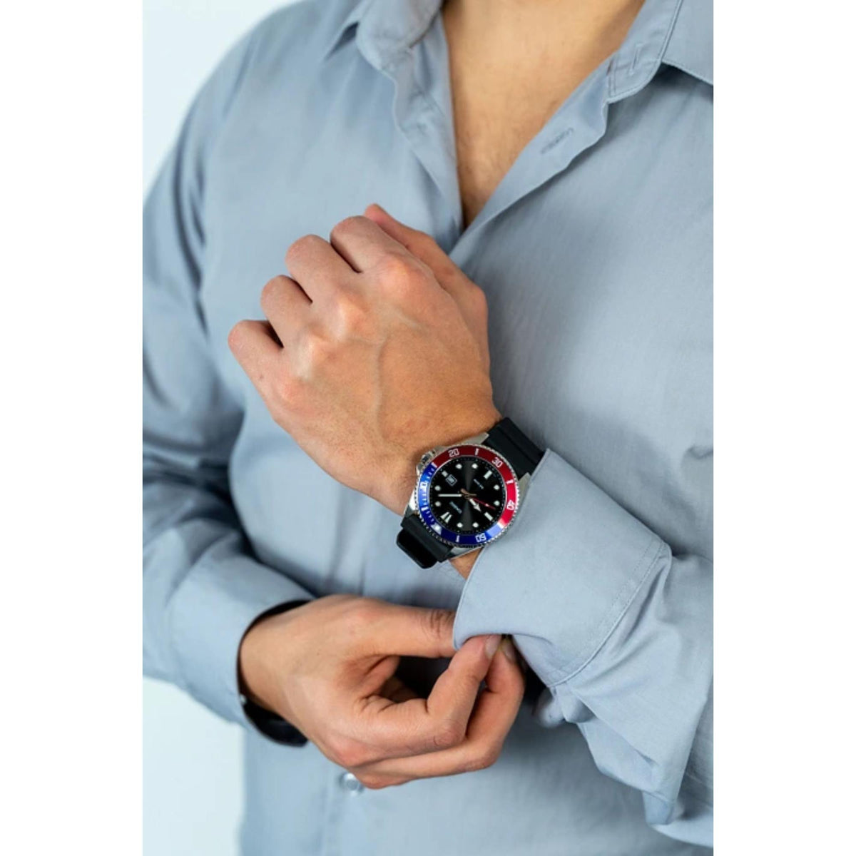 On-wrist view of a man wearing the Casio Marlin MDV-107-1A3VEF quartz watch with a light blue button-up shirt