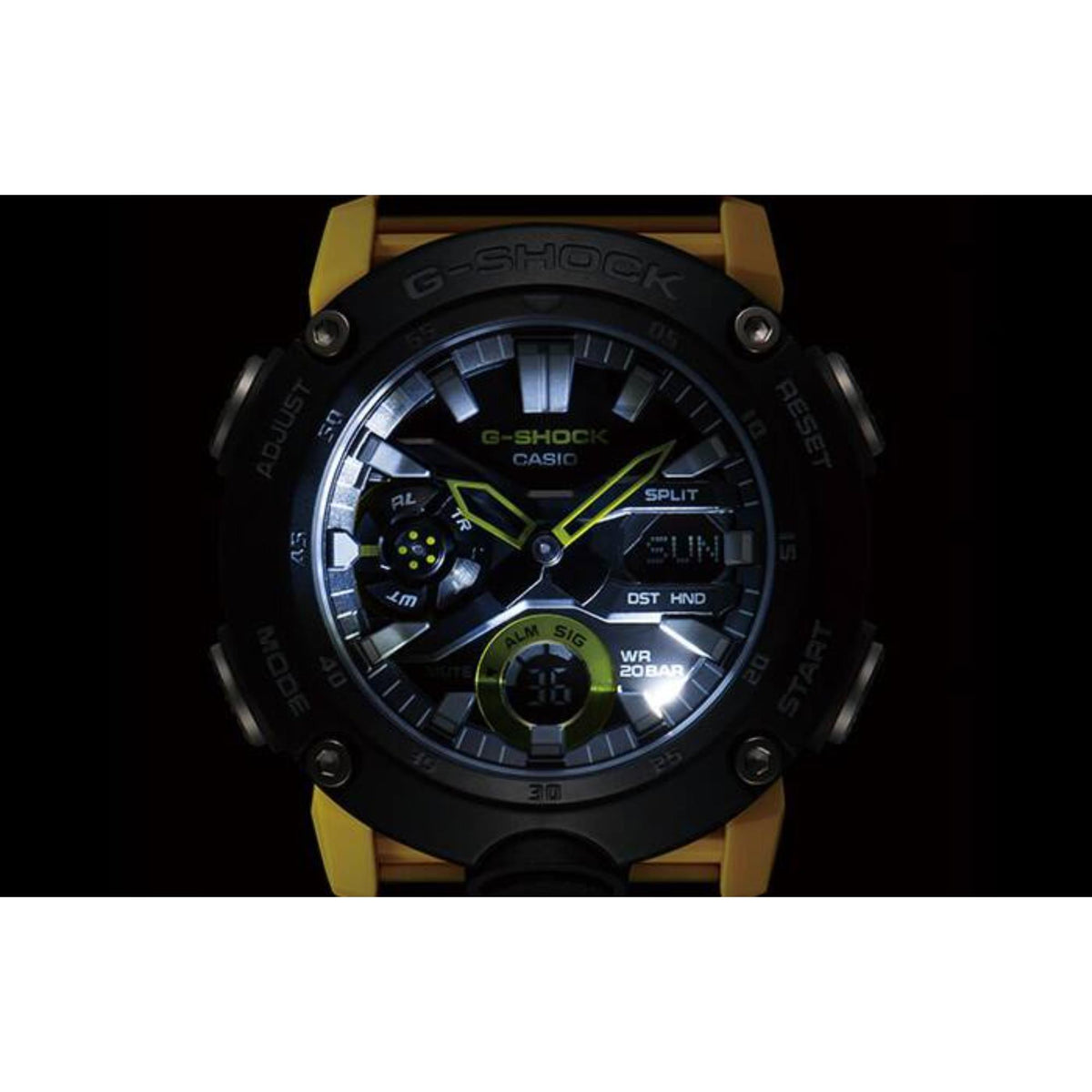 Illuminated black dial and hands of Casio G-Shock Carbon Core Guard GA-2000-1A9ER in low light