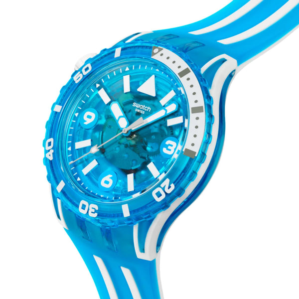 Blue watch face close-up with white markers and bezel, silicone strap and case details