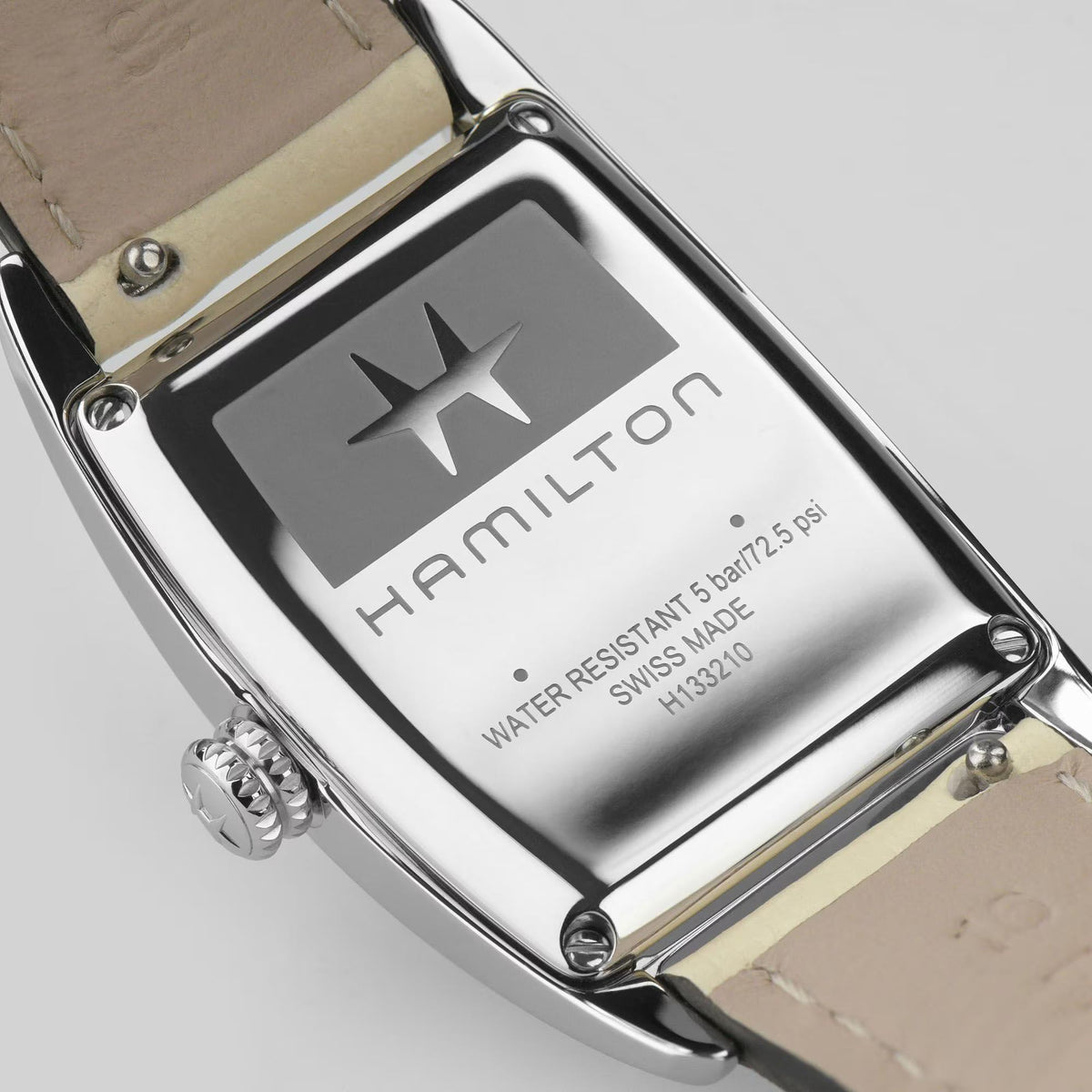 Stainless steel watch caseback with Hamilton branding and water resistance markings