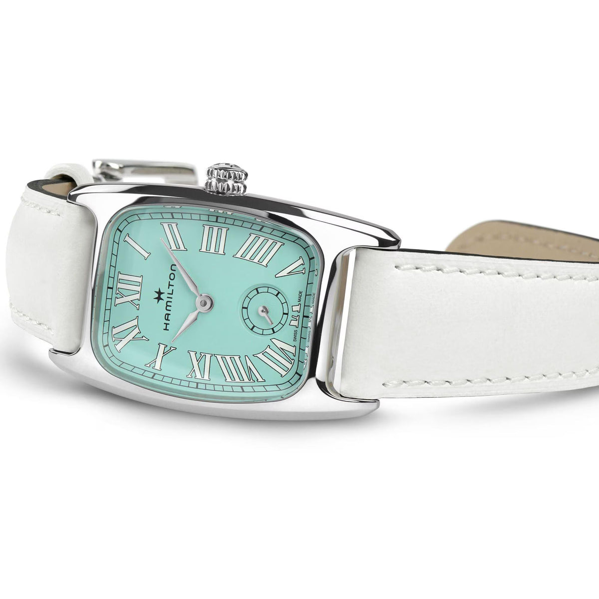 Stainless steel ladies quartz watch with white leather strap and green dial