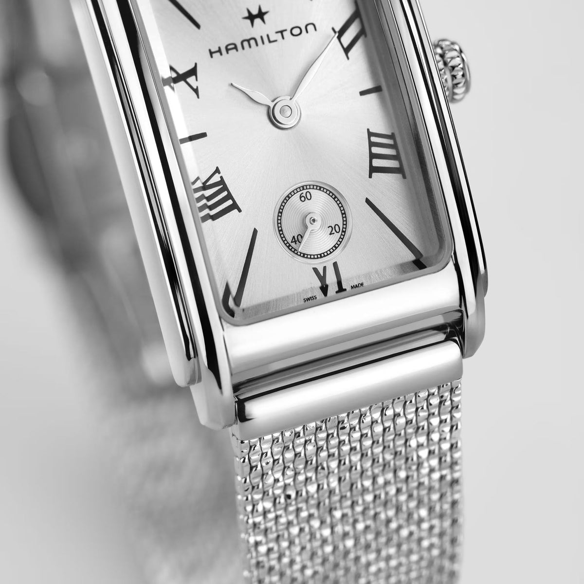 Hamilton ladies quartz watch close-up of silver dial with Roman numerals and star markers