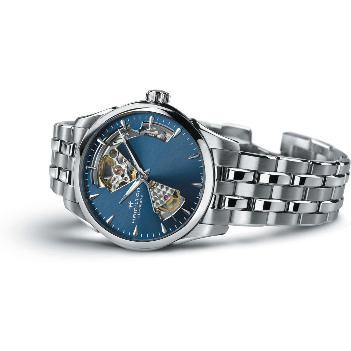 Steel automatic watch with blue dial and open-heart window, exposed movement