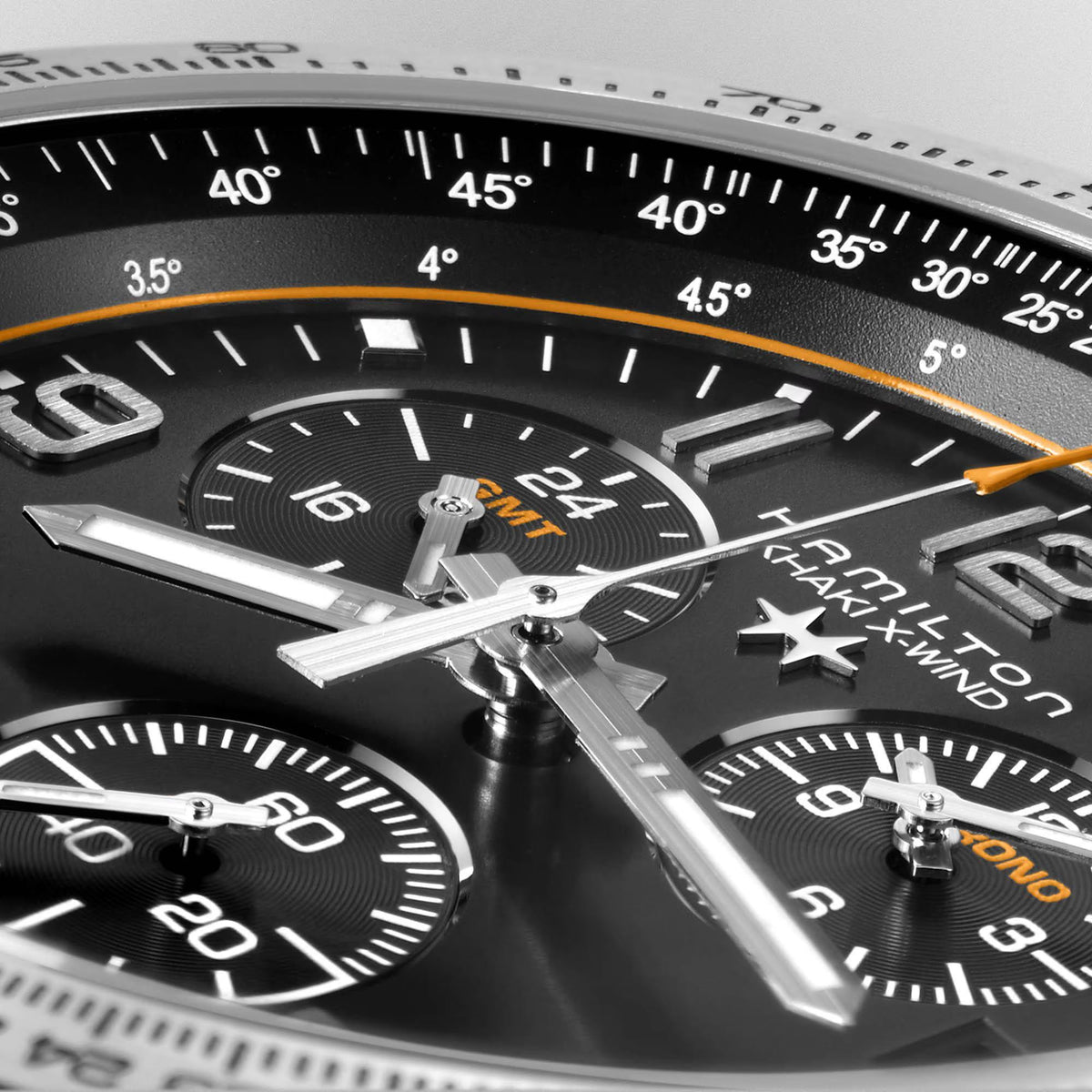 Hamilton Khaki Aviation H77912335 mens watch close-up detail displaying black dial texture, luminous hands, and chronograph sub-dials