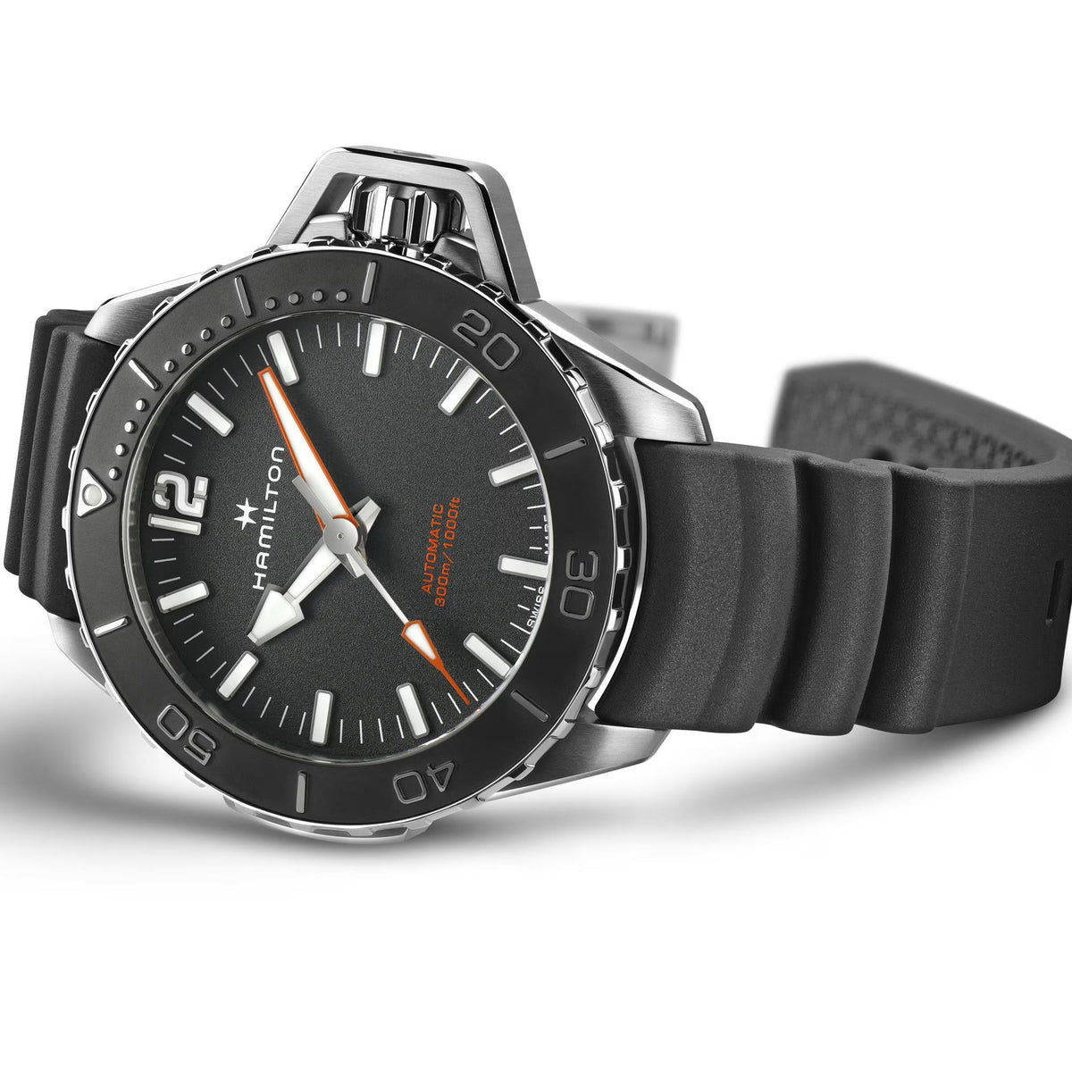 Men's black dial automatic watch with black rubber strap and stainless steel case side