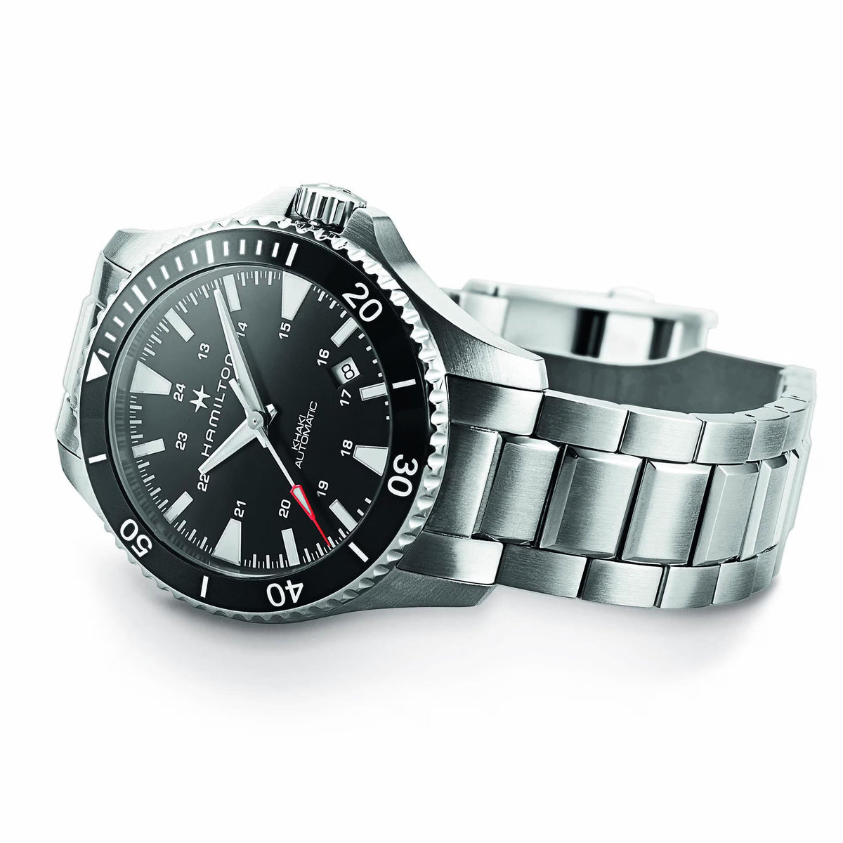 Angled profile of Hamilton Khaki Navy H82335131 showing the brushed steel case, black timing bezel, and crown guard