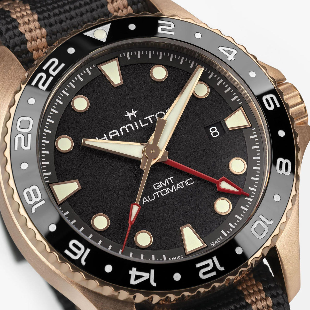 Hamilton Khaki Navy H82565930 detailed view of black dial with luminescent markers and date window