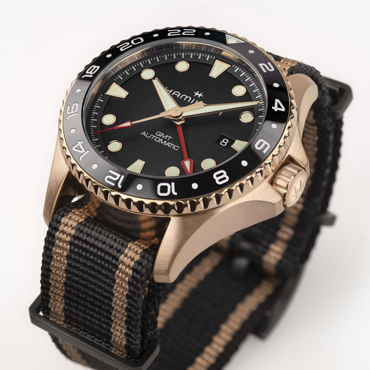 Hamilton Khaki Navy H82565930 angled front view highlighting case profile, crown, and NATO strap