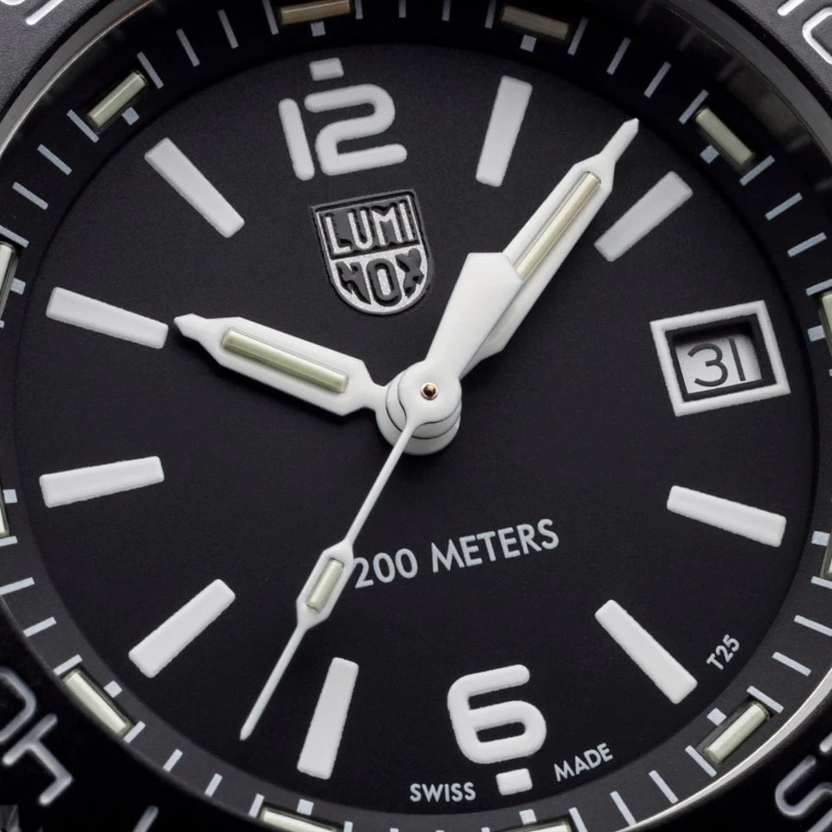 Luminox Pacific Diver XS.3122M close-up view of black dial featuring luminous hands, hour markers, and date display