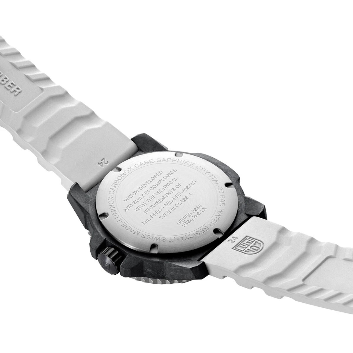 Back of Luminox quartz watch case with engraved text and screw details