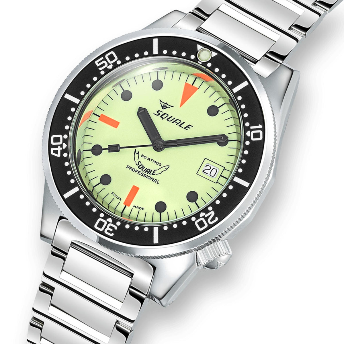Close-up of men's steel watch dial with green lume and black bezel