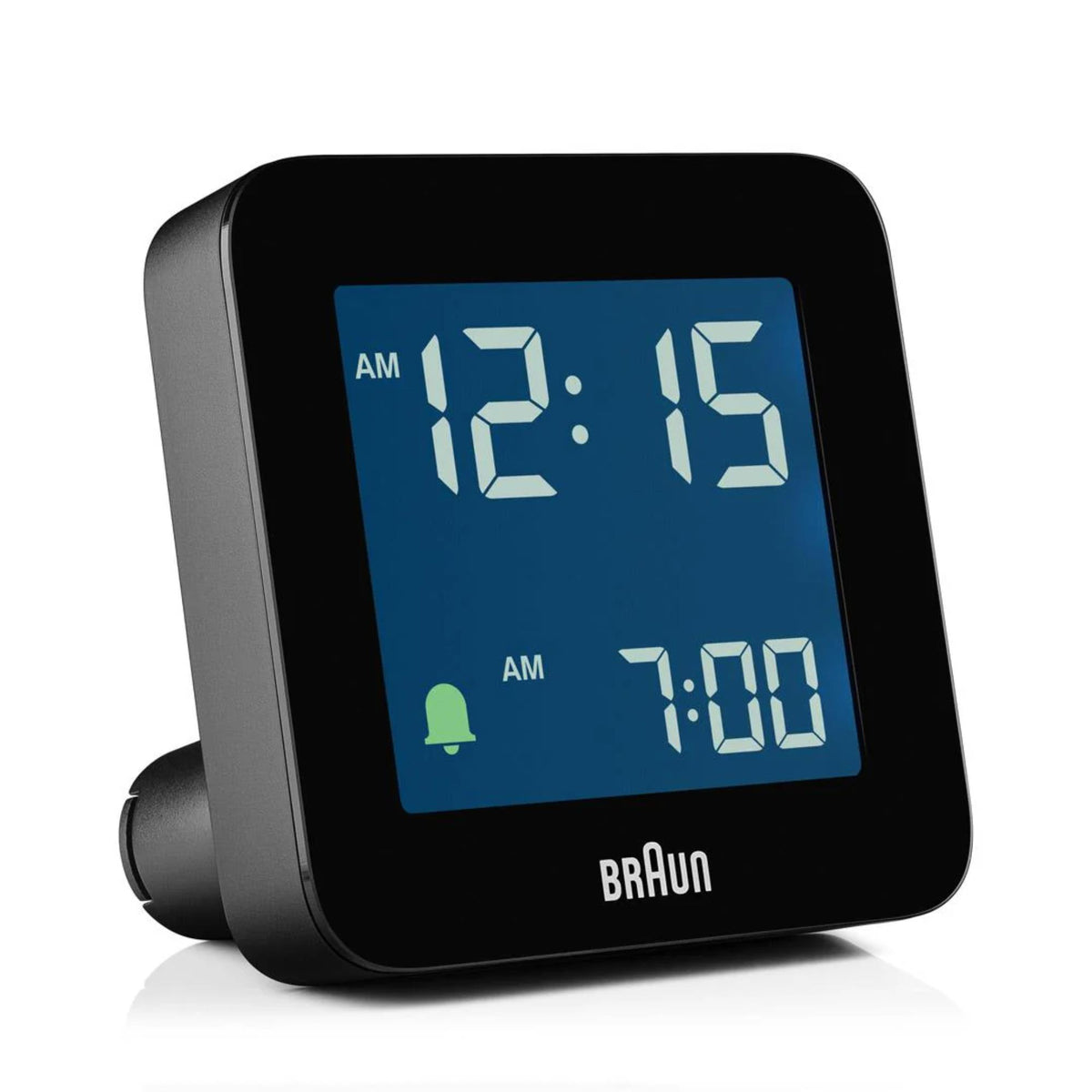 Black digital alarm clock with blue backlit display showing 12:16, 7:00 AM