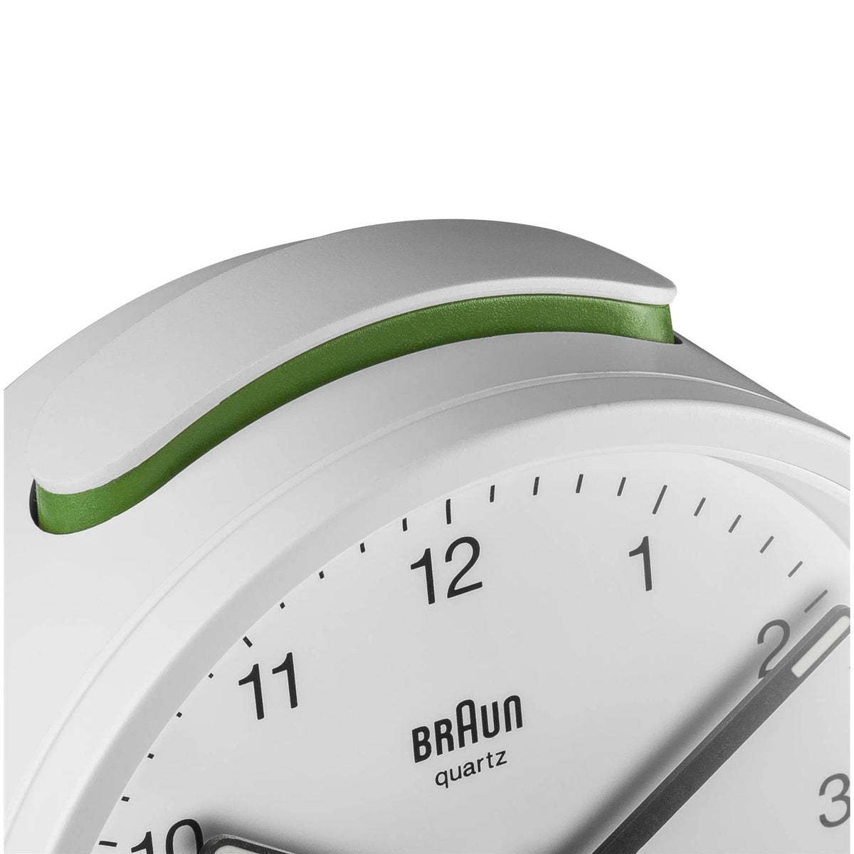 White Braun quartz alarm clock lid with green stripe detail on the top