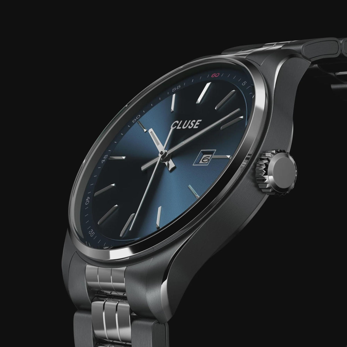 Steel men's wristwatch with blue dial, faceted hour markers, and silver link bracelet.