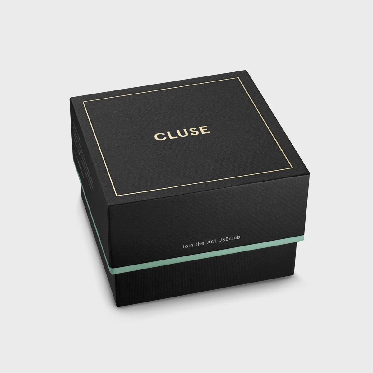 CLUSE watch gift box with black cover and teal accent line.