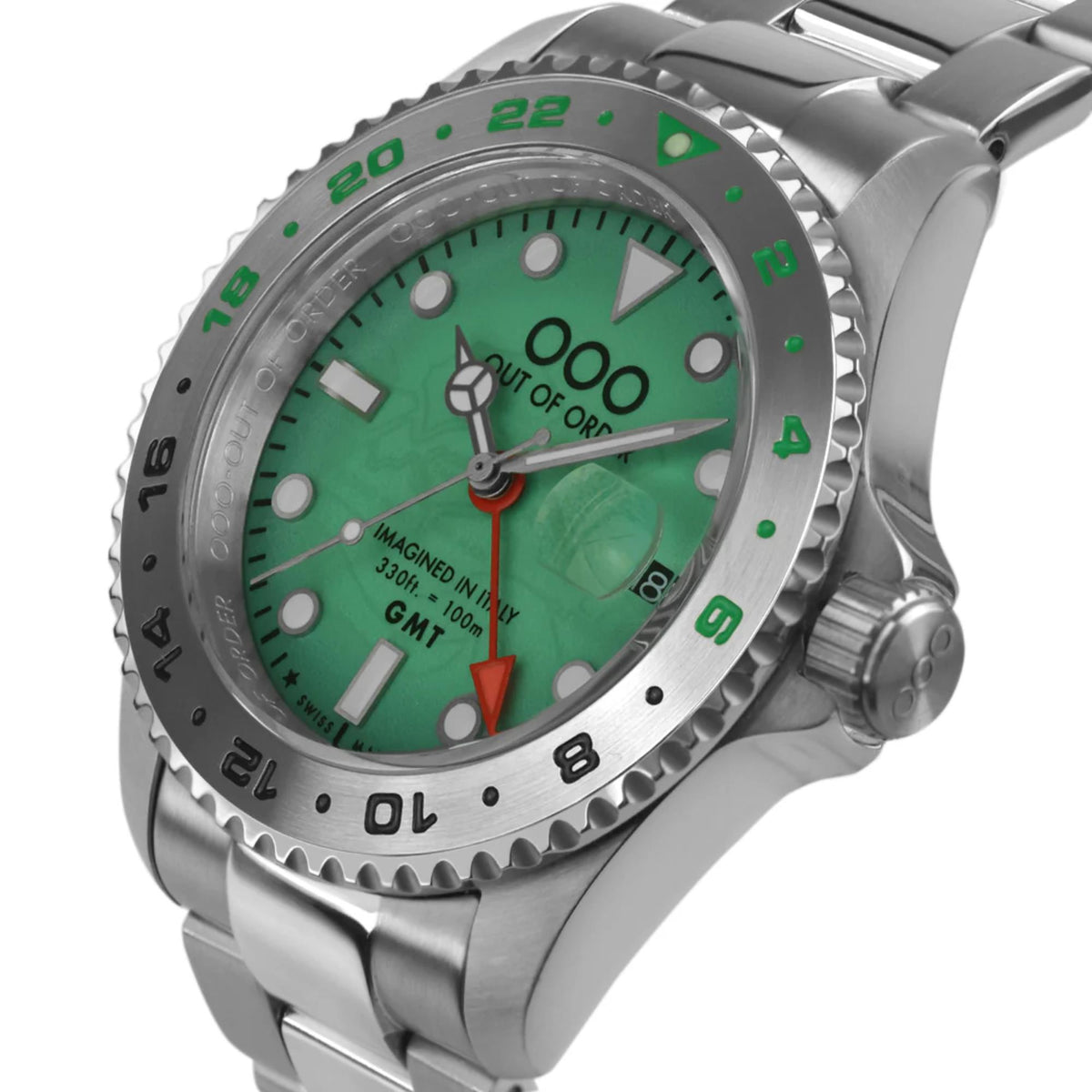 Men's GMT wristwatch angled view: stainless case and bracelet with green dial and bezel numerals.
