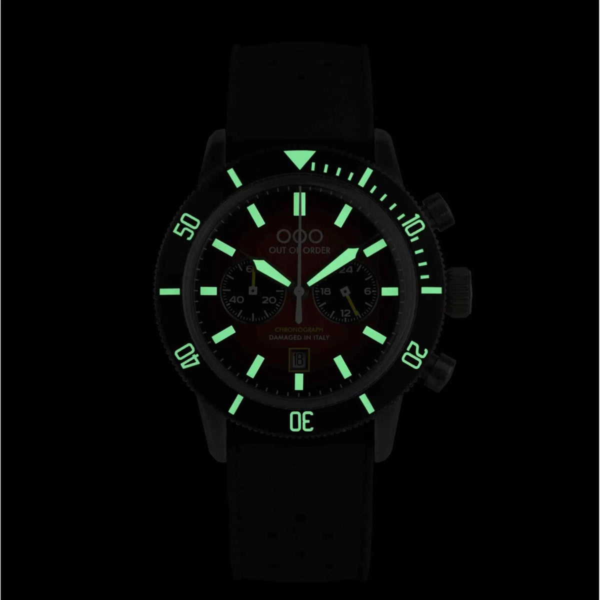 Men's pilot chronograph watch with black case, green-accent black dial, leather strap