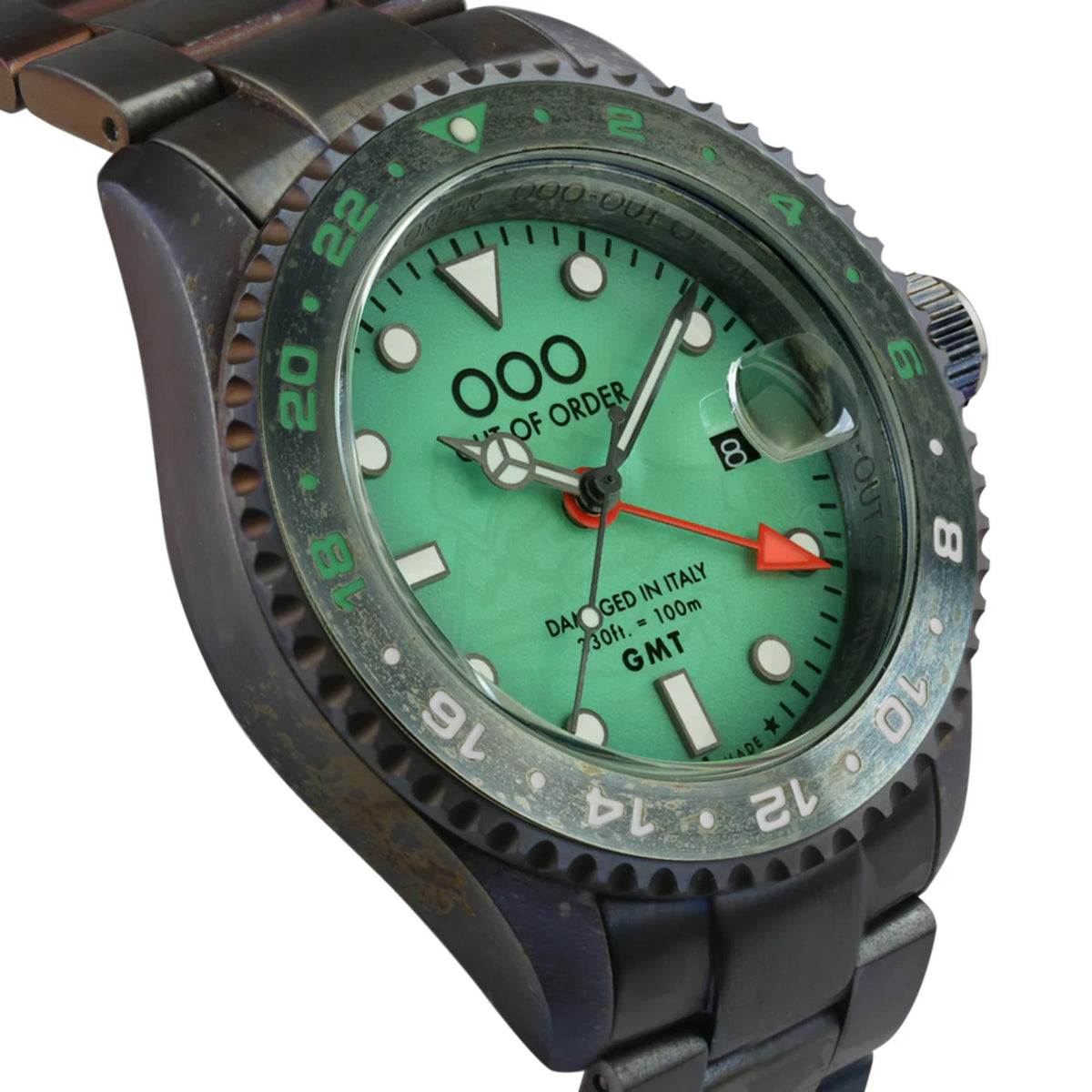 Distressed green GMT dial watch with black steel strap, crown at 3 o'clock, and bezel markings