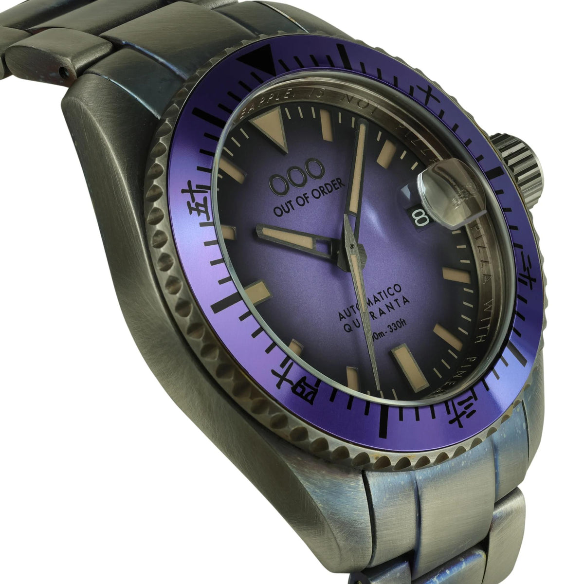 Automatic diver watch with indigo dial, dark bezel accents, and textured steel bracelet