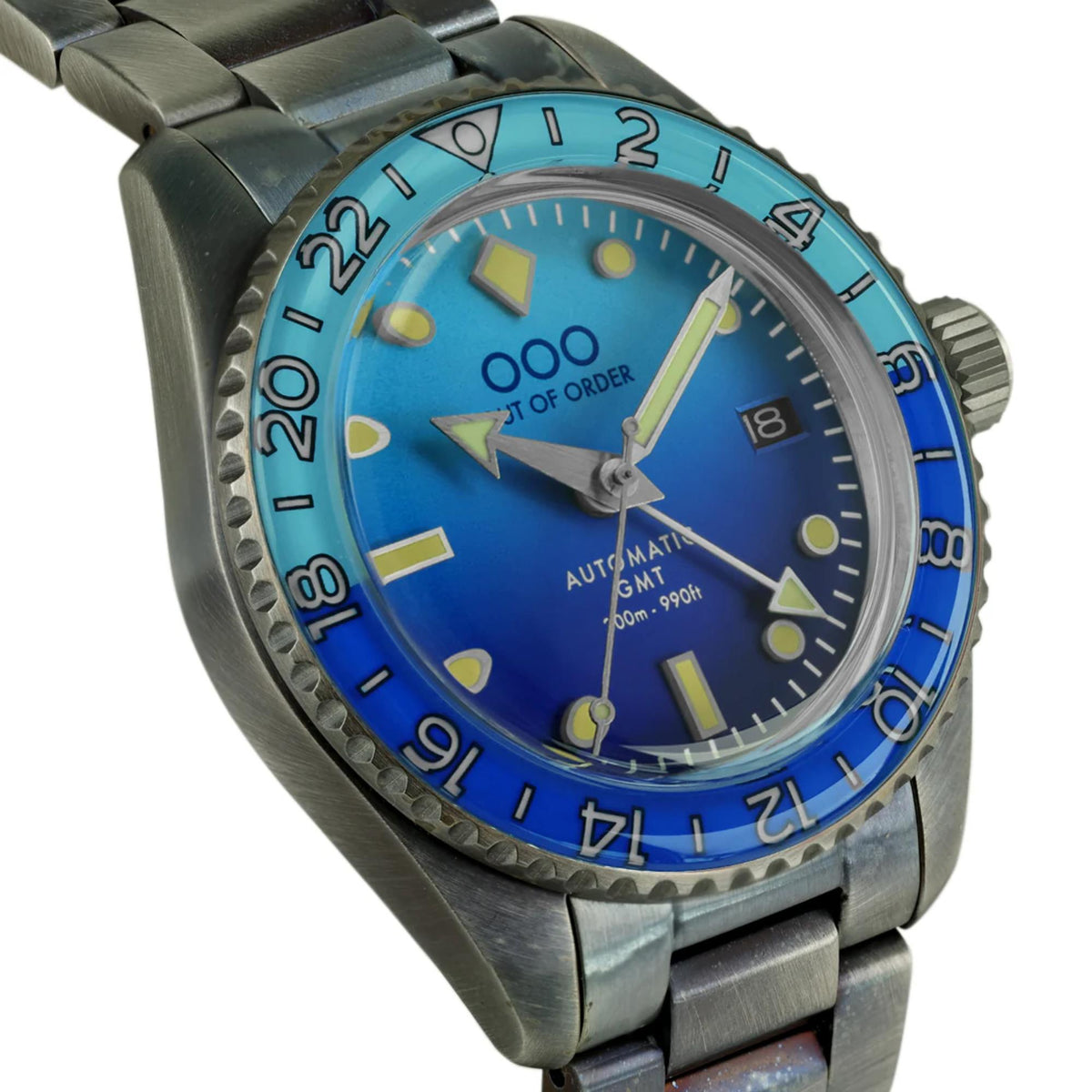 Men's automatic watch with blue dial, steel bracelet, and bold bezel numerals