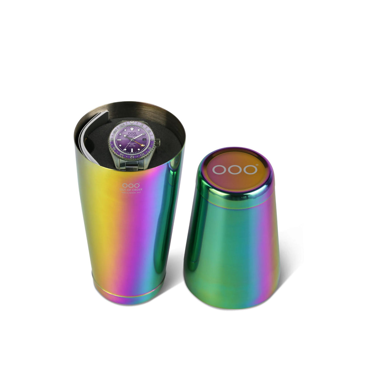 Two iridescent metal cylinders with 000 logo beside a purple dial watch