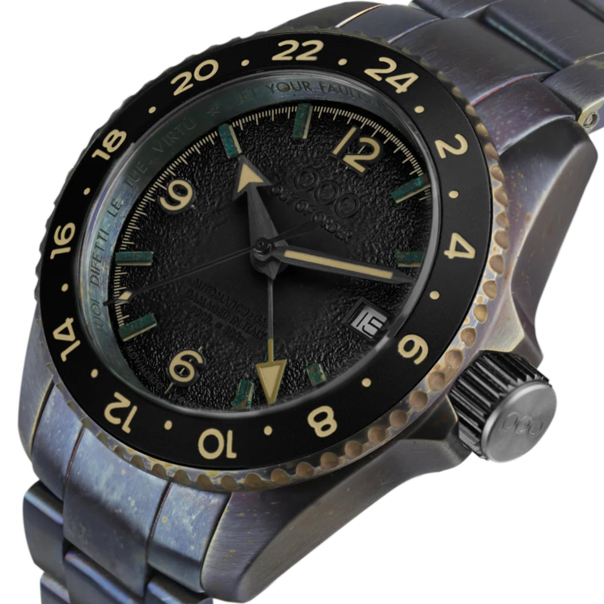 Black dial GMT watch with gold markers, teal accents, black bezel, side crown