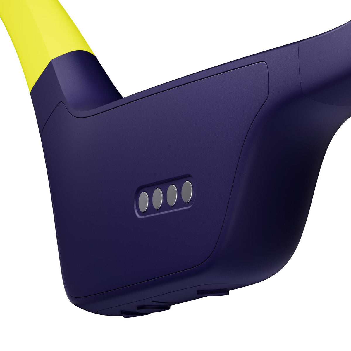 Suunto Aqua SS051108000 lime blue sports open-ear wireless headphones macro close-up showcasing four metallic magnetic charging contacts