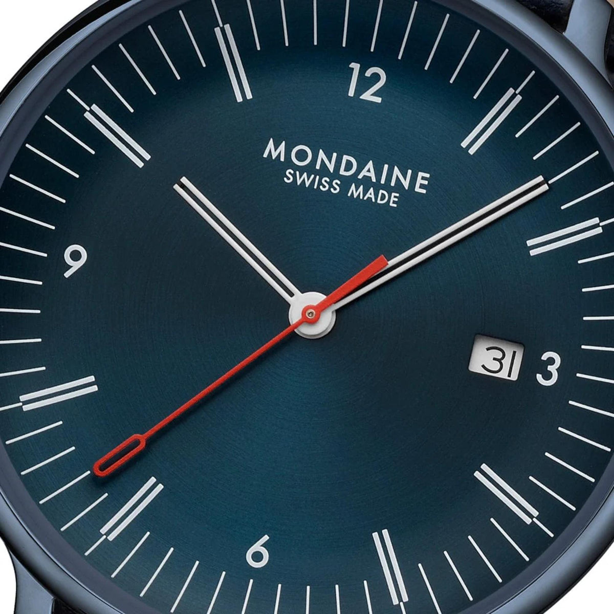 Mondaine Doppio MLE.41240.LDV blue dial close up with signature red second hand and date window