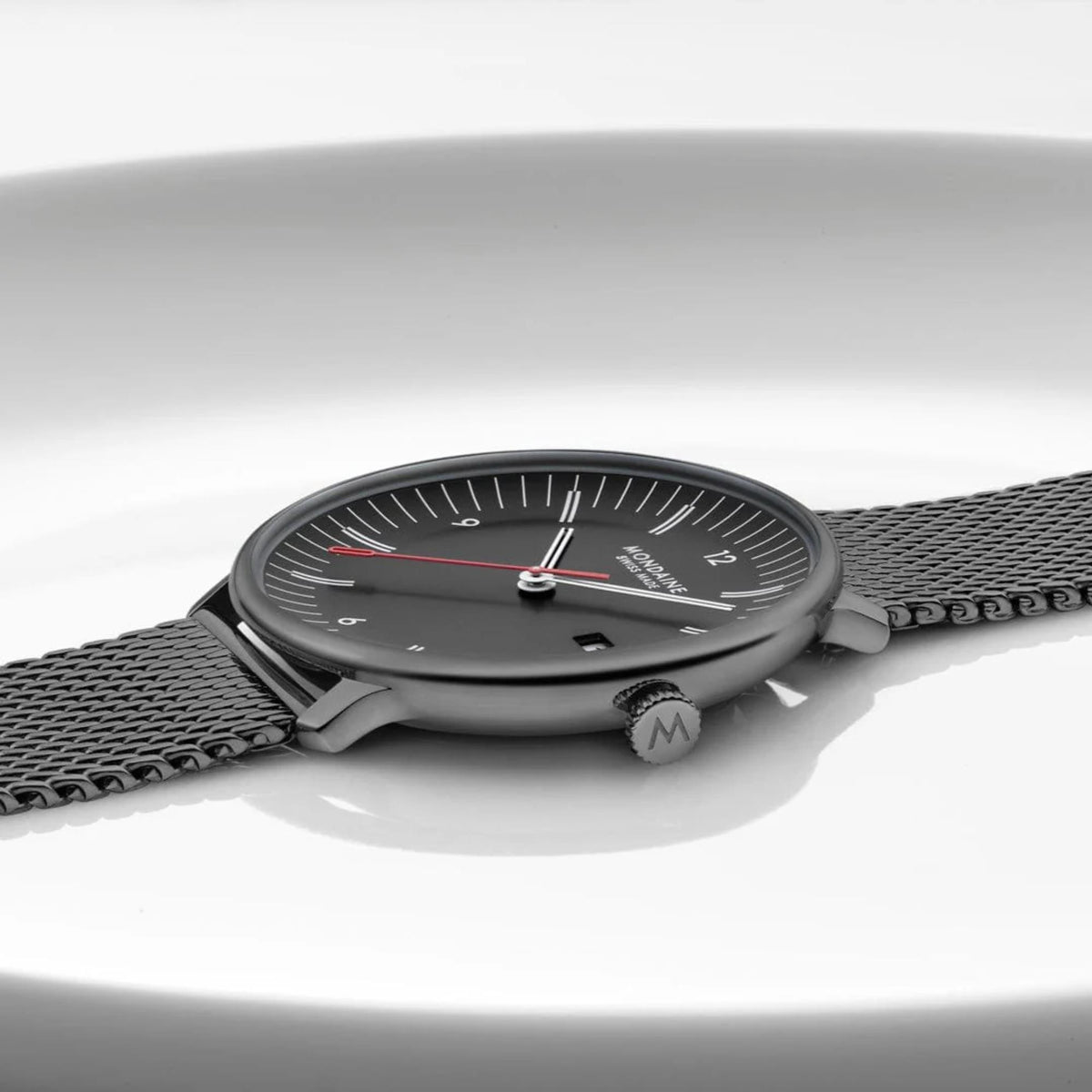 Mondaine Doppio MLE.41220.SM black dial men's watch on white background side angle view