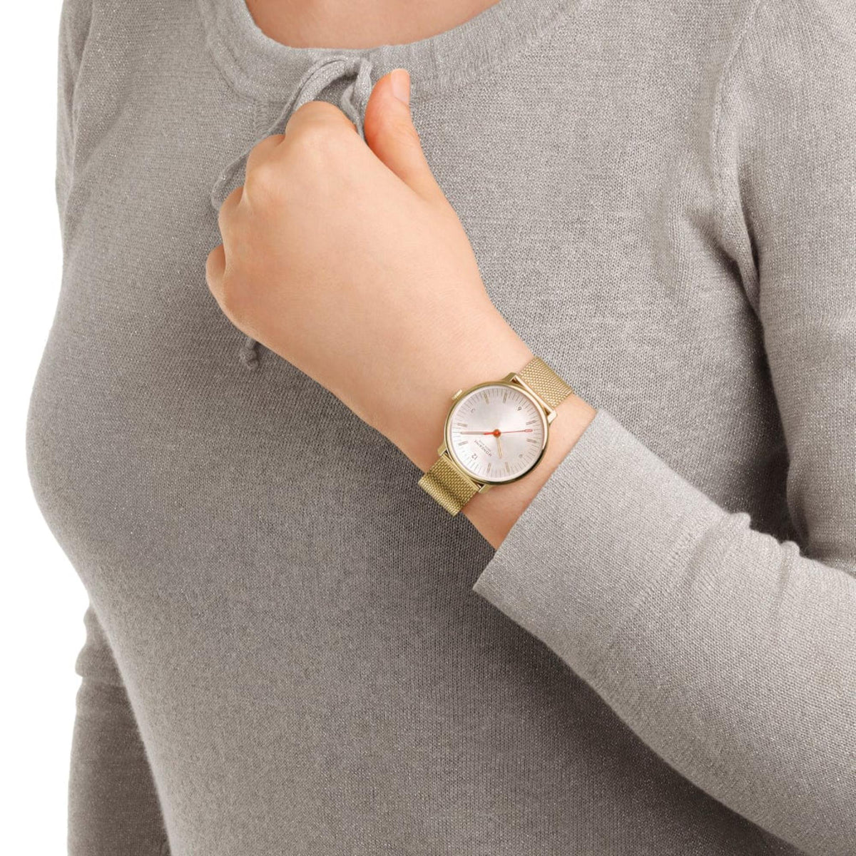 Mondaine Doppio MLE.33111.SM on-wrist view on a woman wearing a grey long sleeve top
