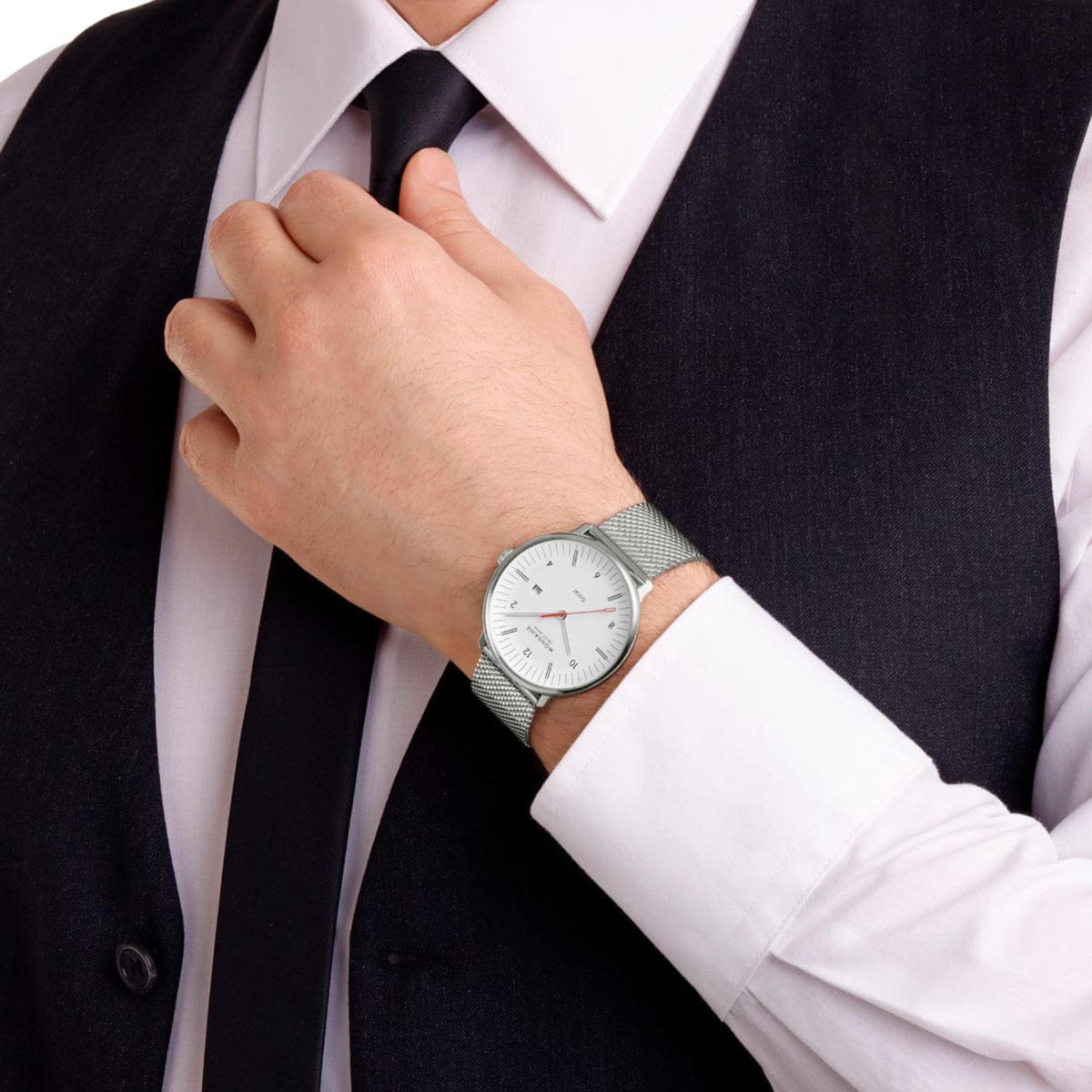 Mondaine Doppio MLE.41910.SM solar white dial watch lifestyle view on a man's wrist wearing a suit vest