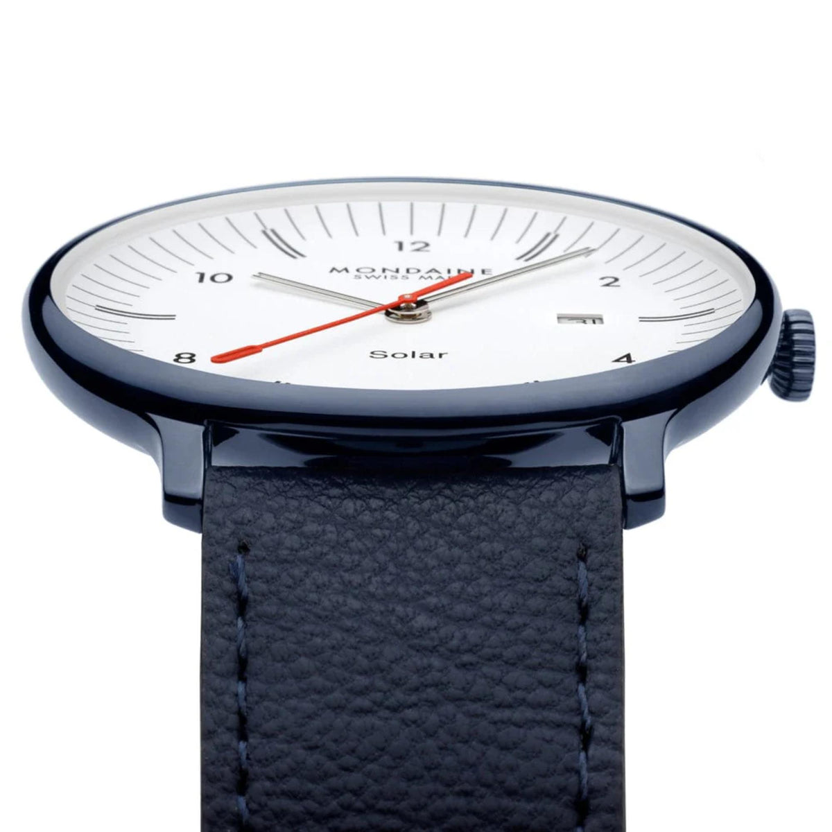 Mondaine Doppio watch MLE.41910.LQV shot highlighting the flat glass crystal, dark navy blue bezel, textured crown, and the textured leather of the blue strap where it meets the lugs