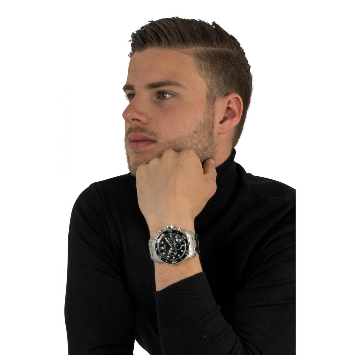 Men's Invicta Pro Diver wristwatch on a person, black dial and stainless steel bracelet