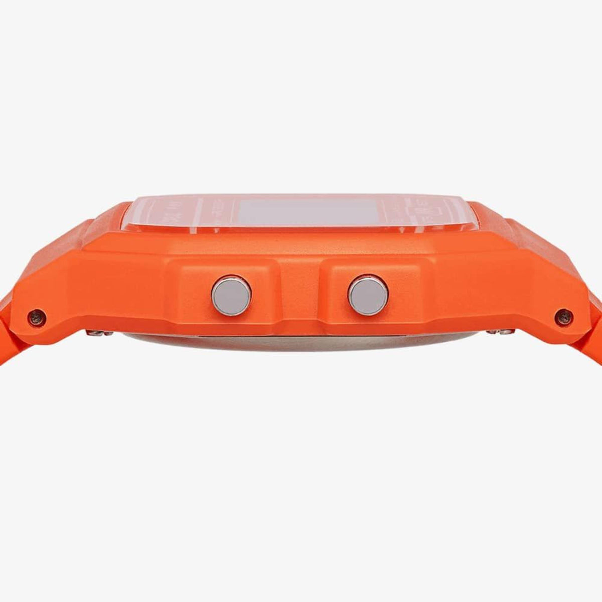 Casio orange resin digital watch side view with two round buttons
