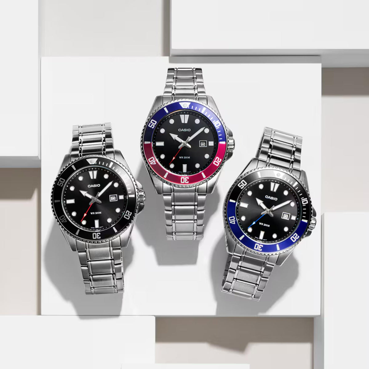 Casio Marlin MDV-107D-1A1VEF watch collection with black, red-blue, and blue bezel variants