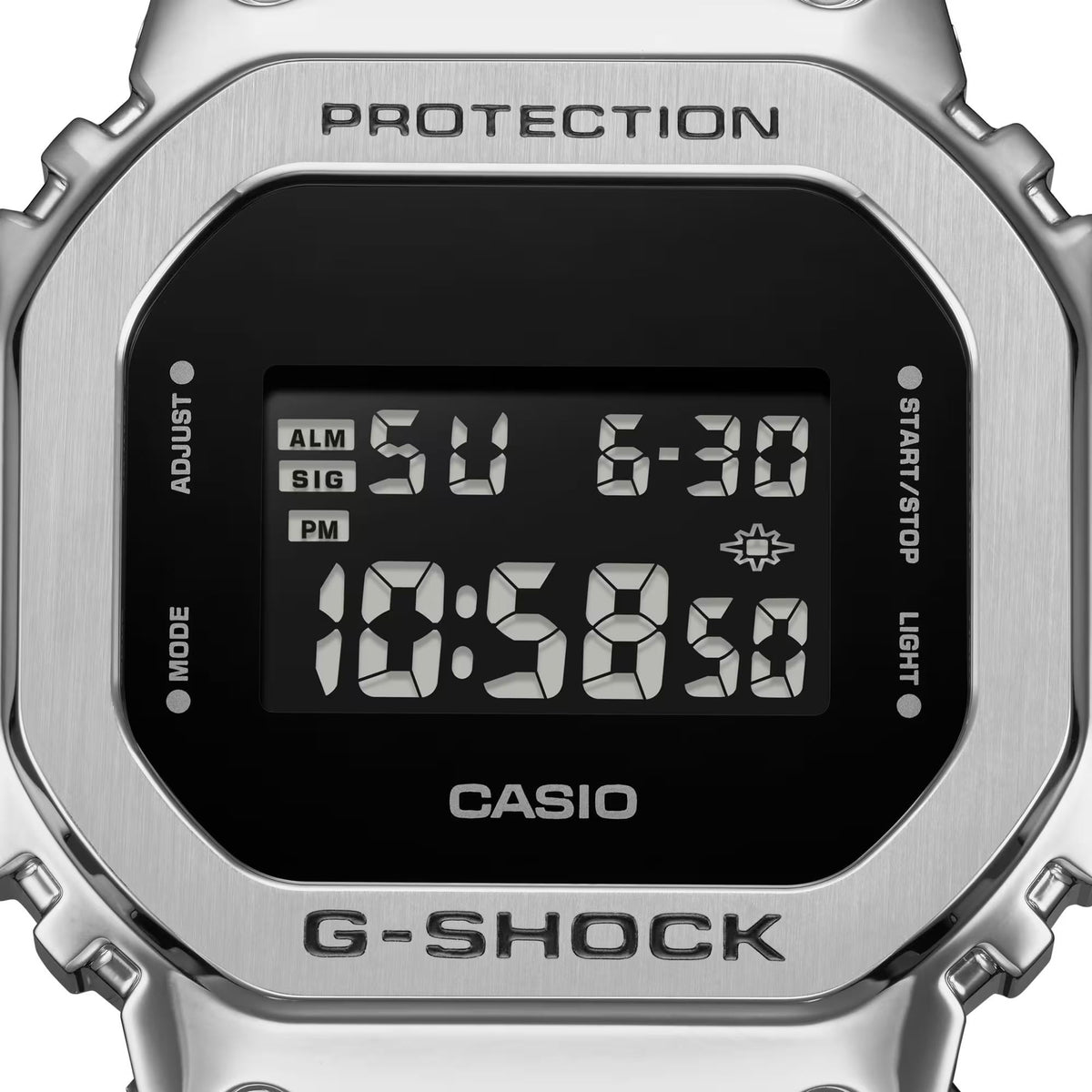 Silver G-Shock digital watch with black LCD and resin case, PROTECTION text