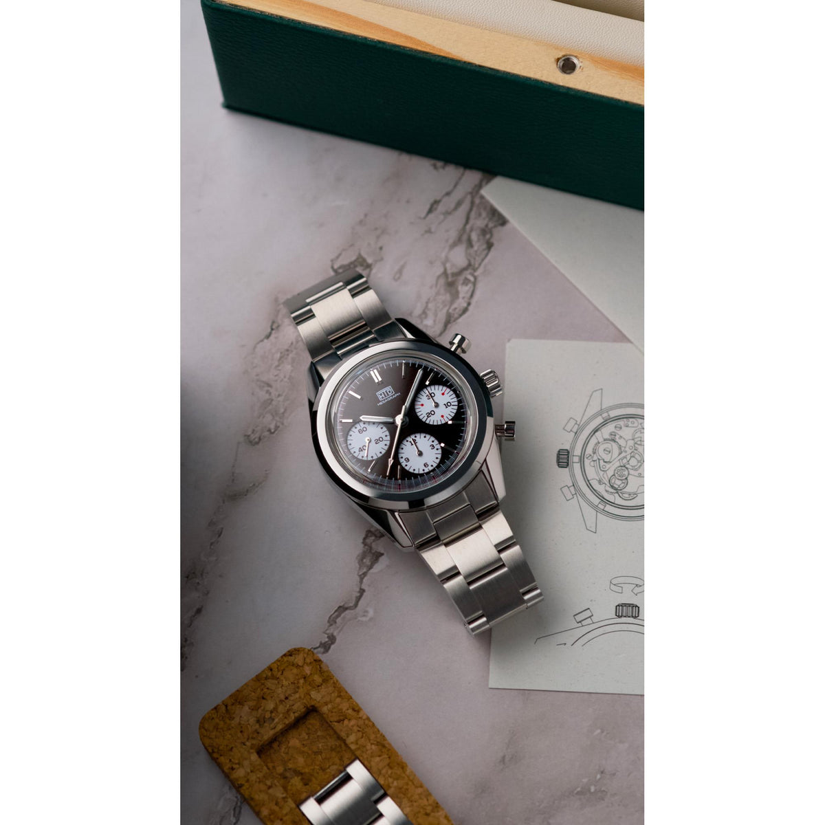 Men's steel chronograph watch with dark dial and three subdials